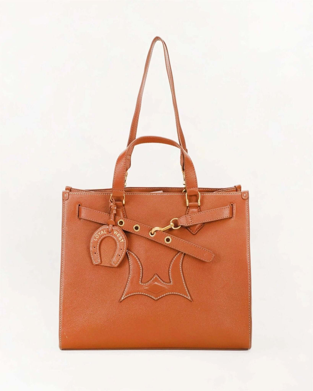 Loyal West medium tote bag with sturdy handles, spacious interior, suitable for everyday use, in a sleek, minimalist design.