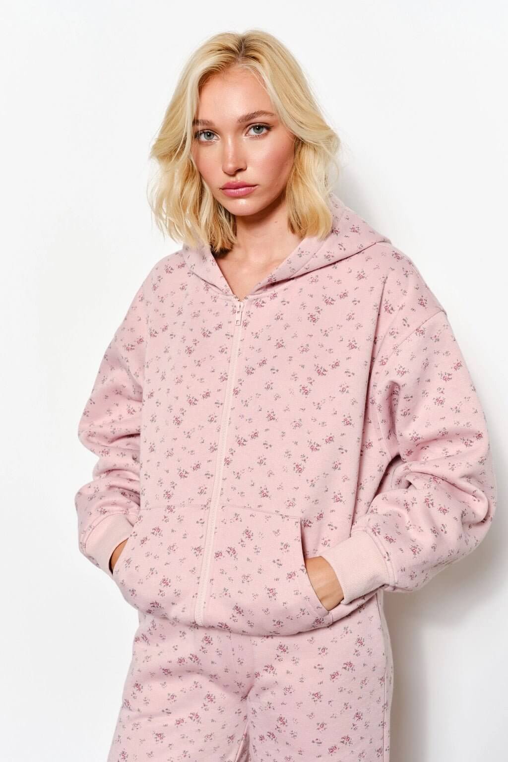 Pretty Garbage Stella Zip Up Hoodie, stylish outerwear with a full front zipper and cozy fit, perfect for casual wear.