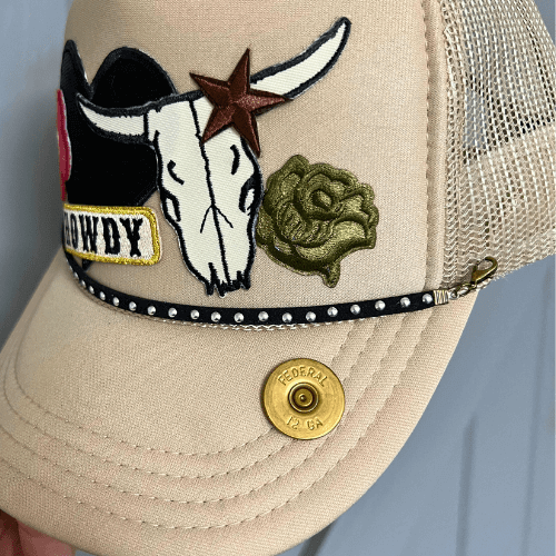 Leather hat chain with metal studs from Brand Dandee, designed to add edgy style to hats and accessories.