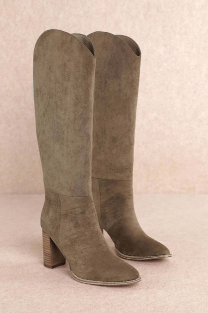 Taupe suede tall Western block heel boots by MI.MI, featuring a stylish design and pointed toe, perfect for Western-inspired outfits.