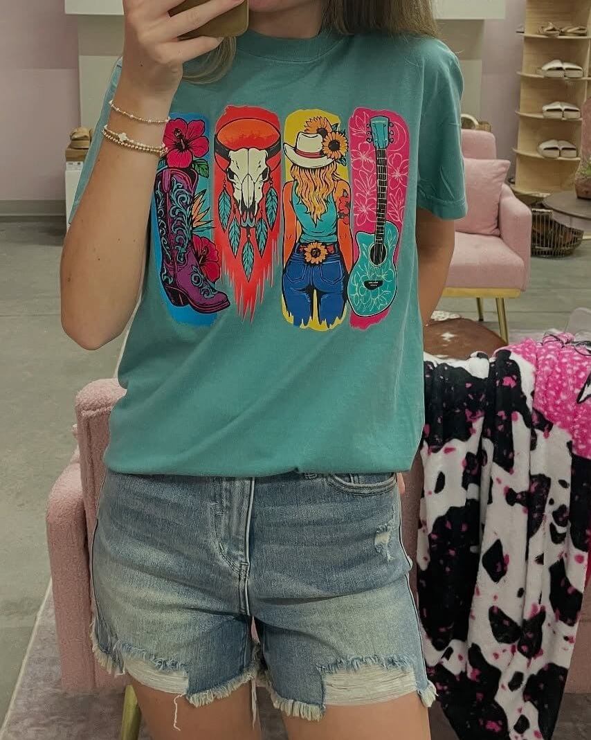 Teal cowgirl graphic T-shirt from L&B Life with western-style cowgirl illustration on soft cotton fabric.