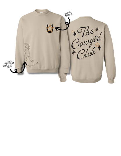Cream-colored graphic sweatshirt featuring "The Cowgirl Club" design by Summer Tees, with a relaxed crewneck fit and western-inspired style.