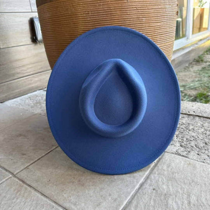 Vegan felt rancher hat from Queens INC in various colors, featuring a wide brim and classic cowboy style.