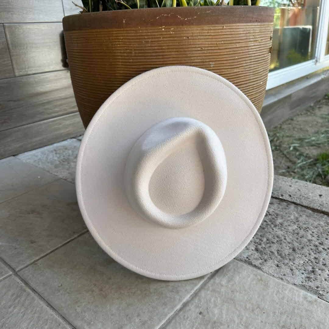 Vegan felt rancher hat by Queens INC in multiple colors, featuring a wide brim and classic cowboy hat style.