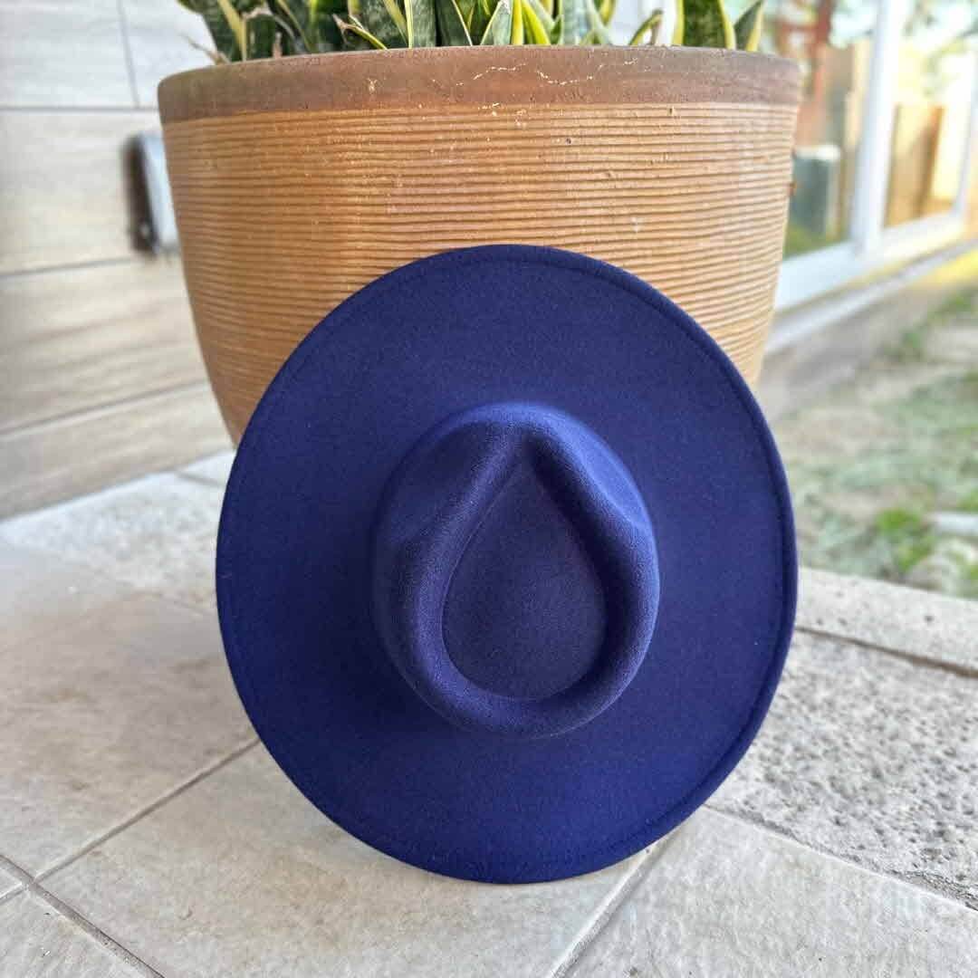 Vegan felt rancher hat by Queens INC in a stylish wide-brim design, available in over 25 vibrant colors.