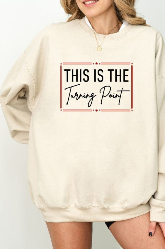 Ocean and 7th "This Is The Turning Point" graphic sweatshirt with bold text and comfortable fit, displayed on a mannequin.