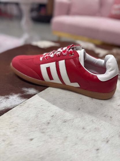 Red and white Trackstar sneaker by Dirty Laundry with stylish design and sporty look, shown in a close-up side view.