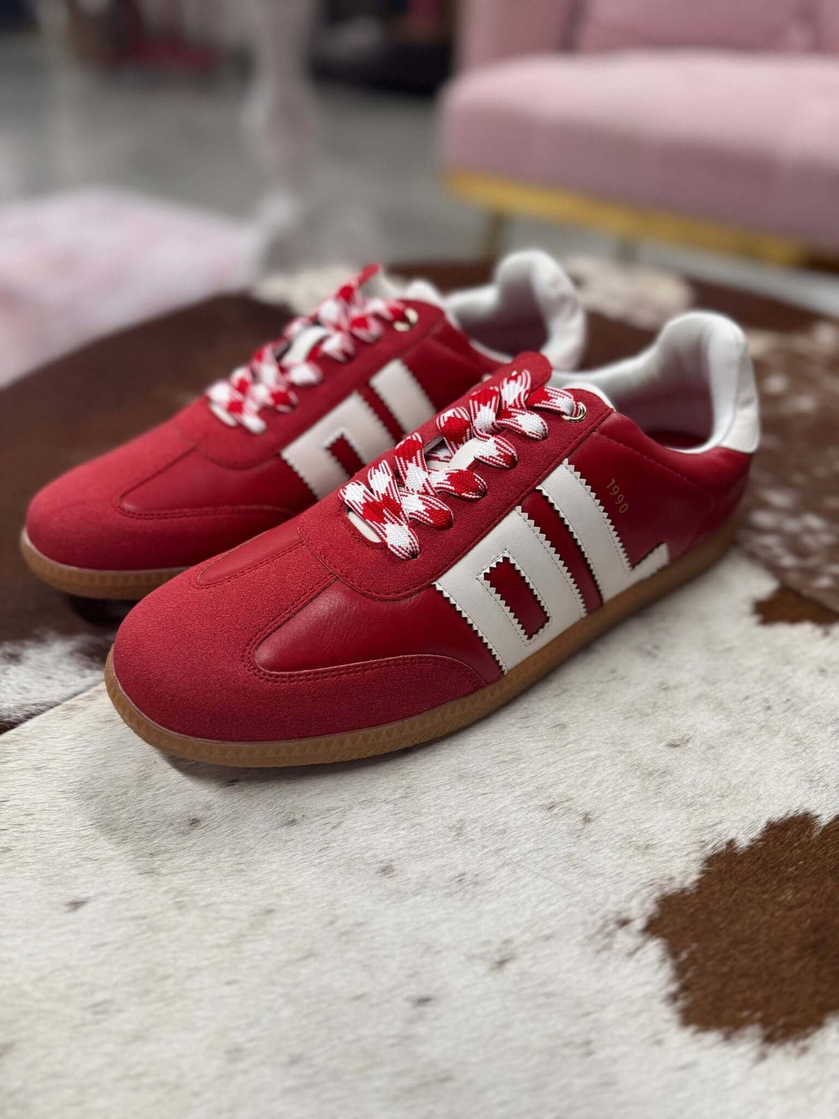 Red and white Trackstar sneaker by Dirty Laundry, featuring stylish design and comfortable athletic fit.