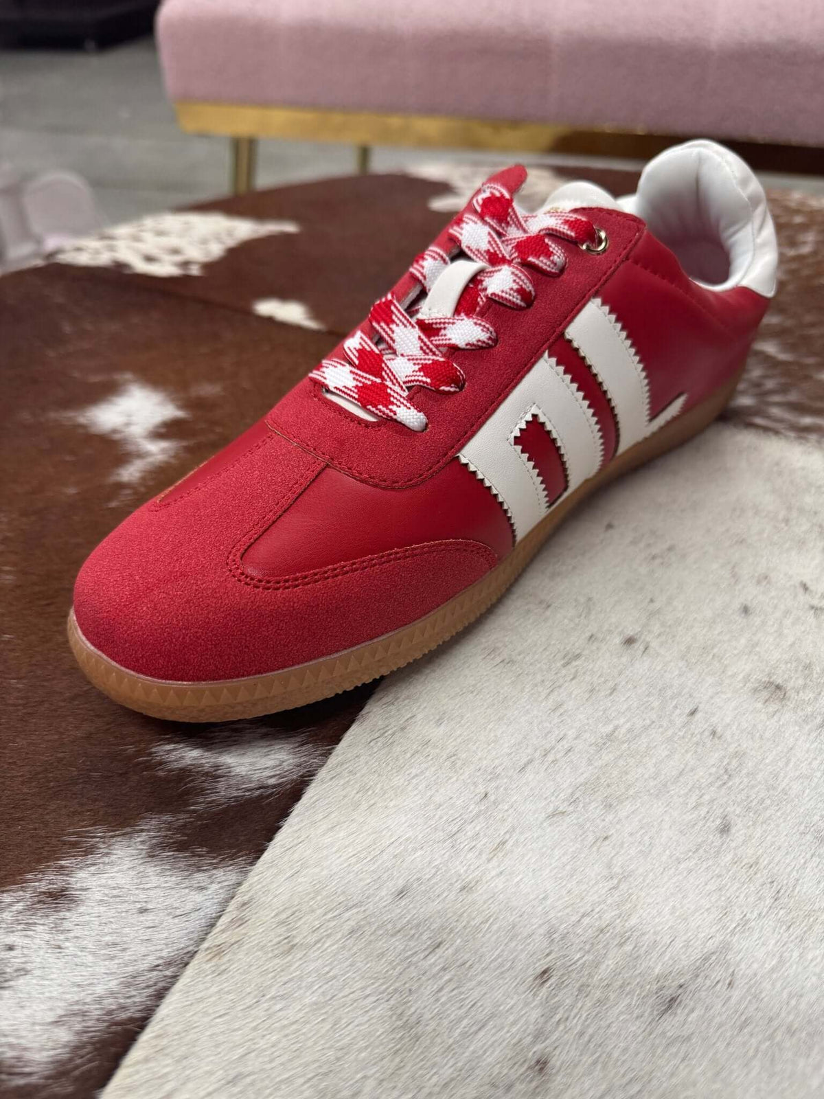 Red and white Trackstar sneaker by Dirty Laundry with stylish design and athletic-inspired features.