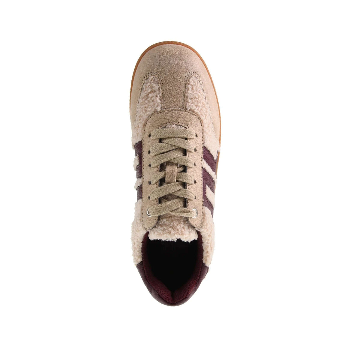 Dirty Laundry Trackstar Sneaker Shearli showing stylish white sneakers with black accents and a textured sole.