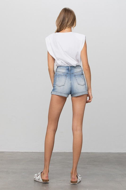 Insane Gene high-rise distressed denim shorts with tummy control and elastic waistband, styled for a trendy casual look.
