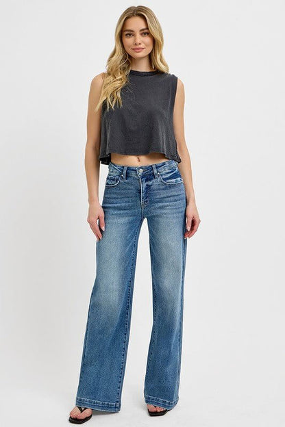 Risen high-rise wide-leg jeans with tummy control and adjustable waistband, denim bottoms with a relaxed fit.
