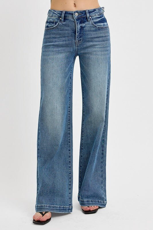 Risen high-rise wide-leg jeans with tummy control and adjustable waistband, made from durable denim fabric.