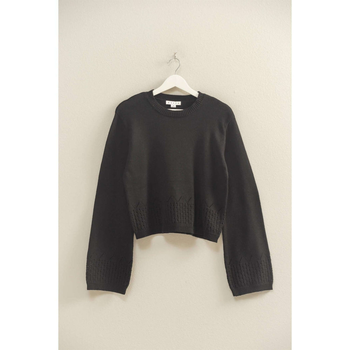 HYFVE eyelet detailed long sleeve sweater featuring intricate eyelet patterns and a comfortable fit, perfect for casual wear.