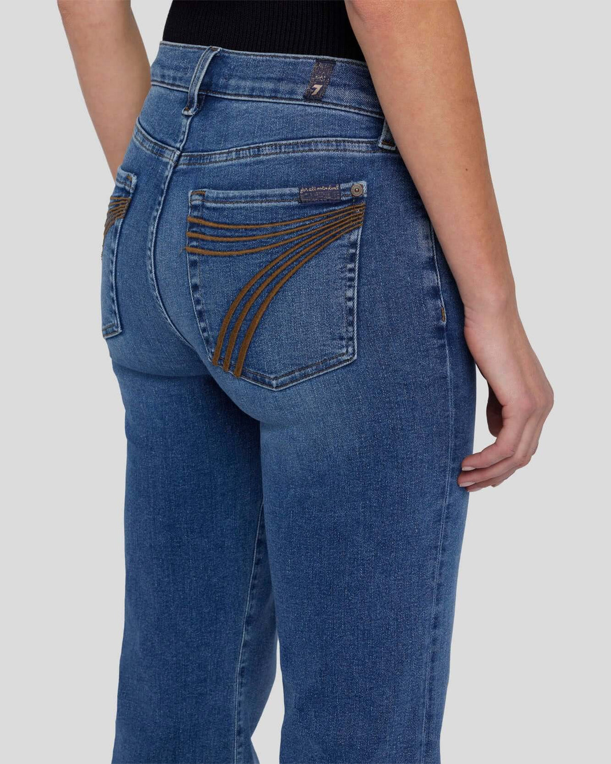 7 For All Mankind Dojo Clara jeans, women's casual bottoms featuring classic denim style and a fitted silhouette.