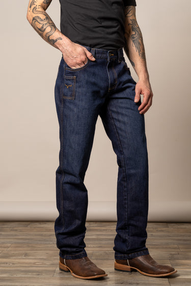 Kimes Ranch Watson men's dark wash relaxed bootcut denim jeans laid flat showing back pockets and classic fit style.