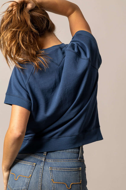 Kimes Ranch women's navy cropped short sleeve sweatshirt with graphic design, casual and stylish for comfortable wear.
