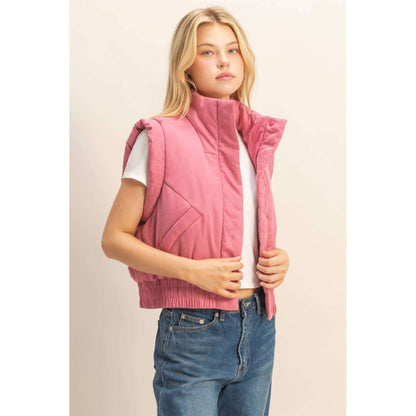 HYFVE versatile puffer vest in black, lightweight outerwear with quilted design and stand collar for cozy warmth and style.