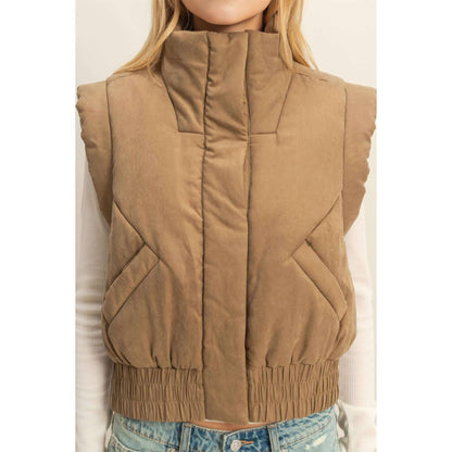 HYFVE versatile puffer vest in black, showcasing its quilted design and sleeveless style, ideal for layered outerwear.