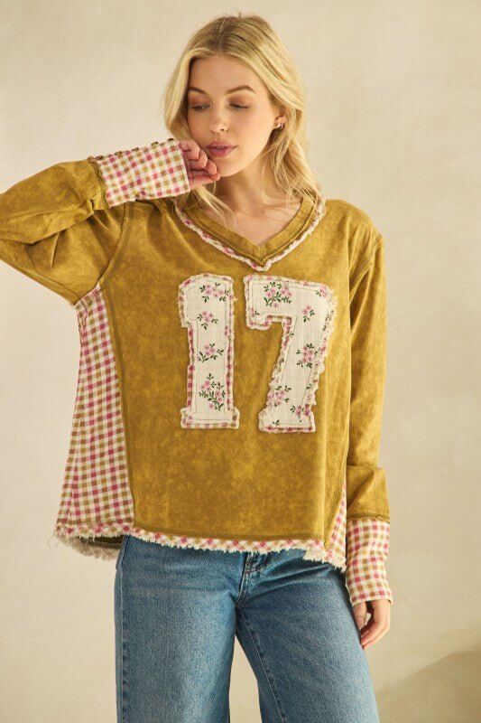 Vintage mustard floral patchwork sweater with number 17 design by Sage + Fig, featuring cozy knit and vibrant floral accents.