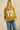 Vintage mustard floral patchwork short sleeve sweater from Sage + Fig, featuring a stylish number 17 design.