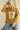 Vintage mustard floral patchwork short sleeve sweater by Sage + Fig, featuring a number 17 design and casual, cozy style.