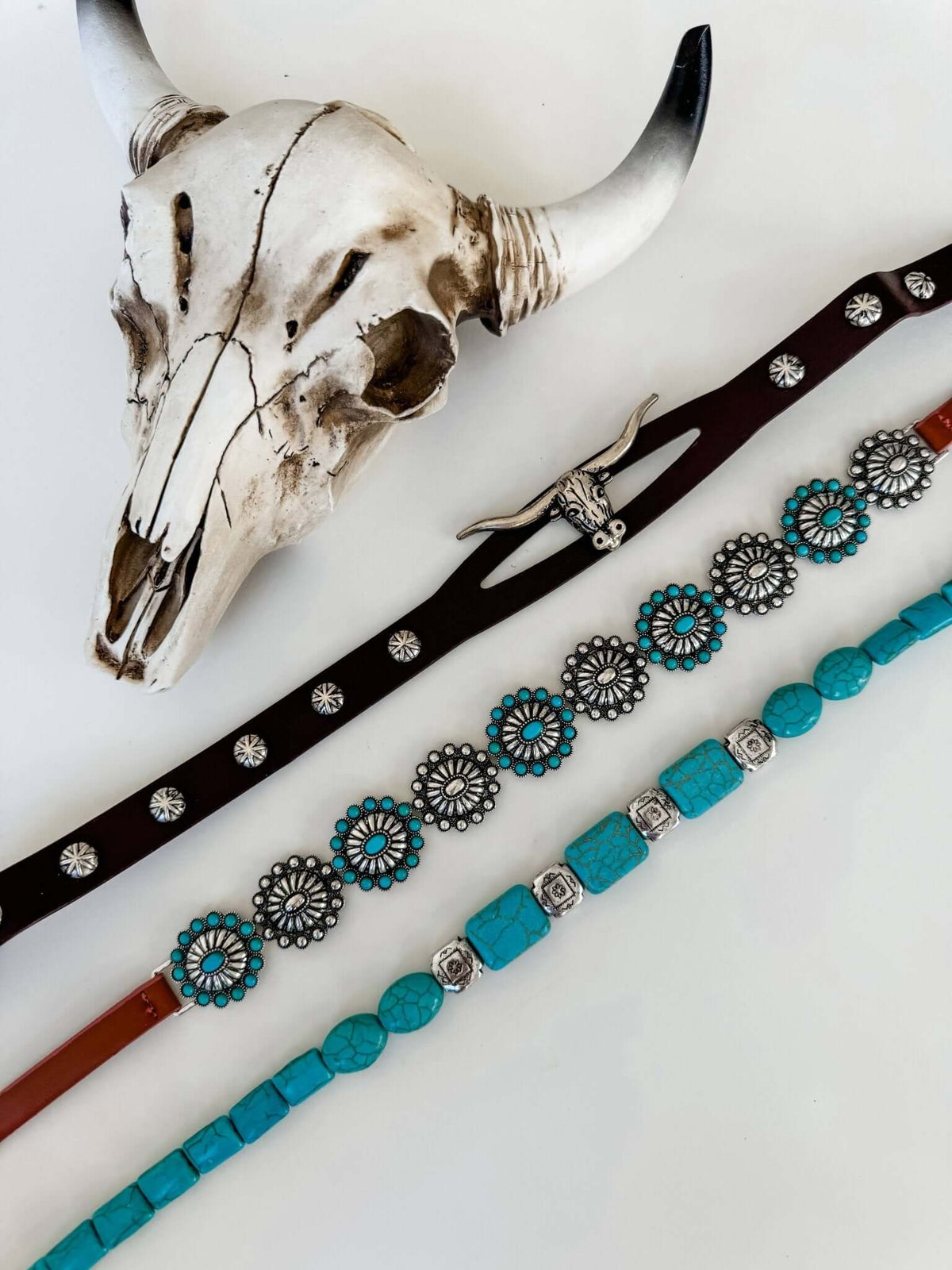 Western hat band with concho accents, stone details, and longhorn steer motif, designed for stylish hat accessories.
