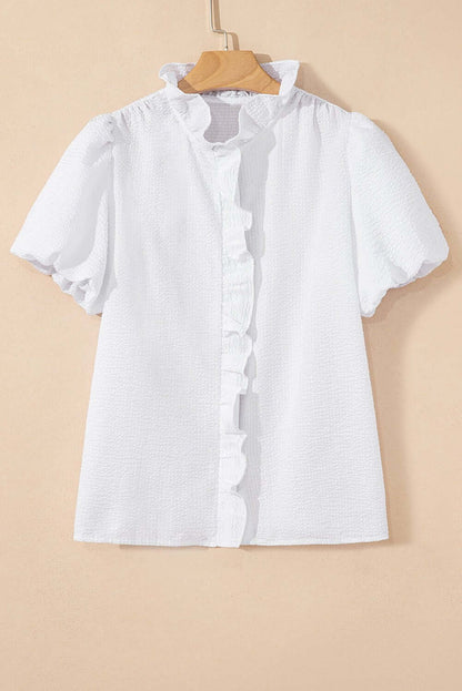 White ruffle-front puff sleeve blouse by Cowgirl Charm, stylish top with feminine ruffles and puffed sleeves.