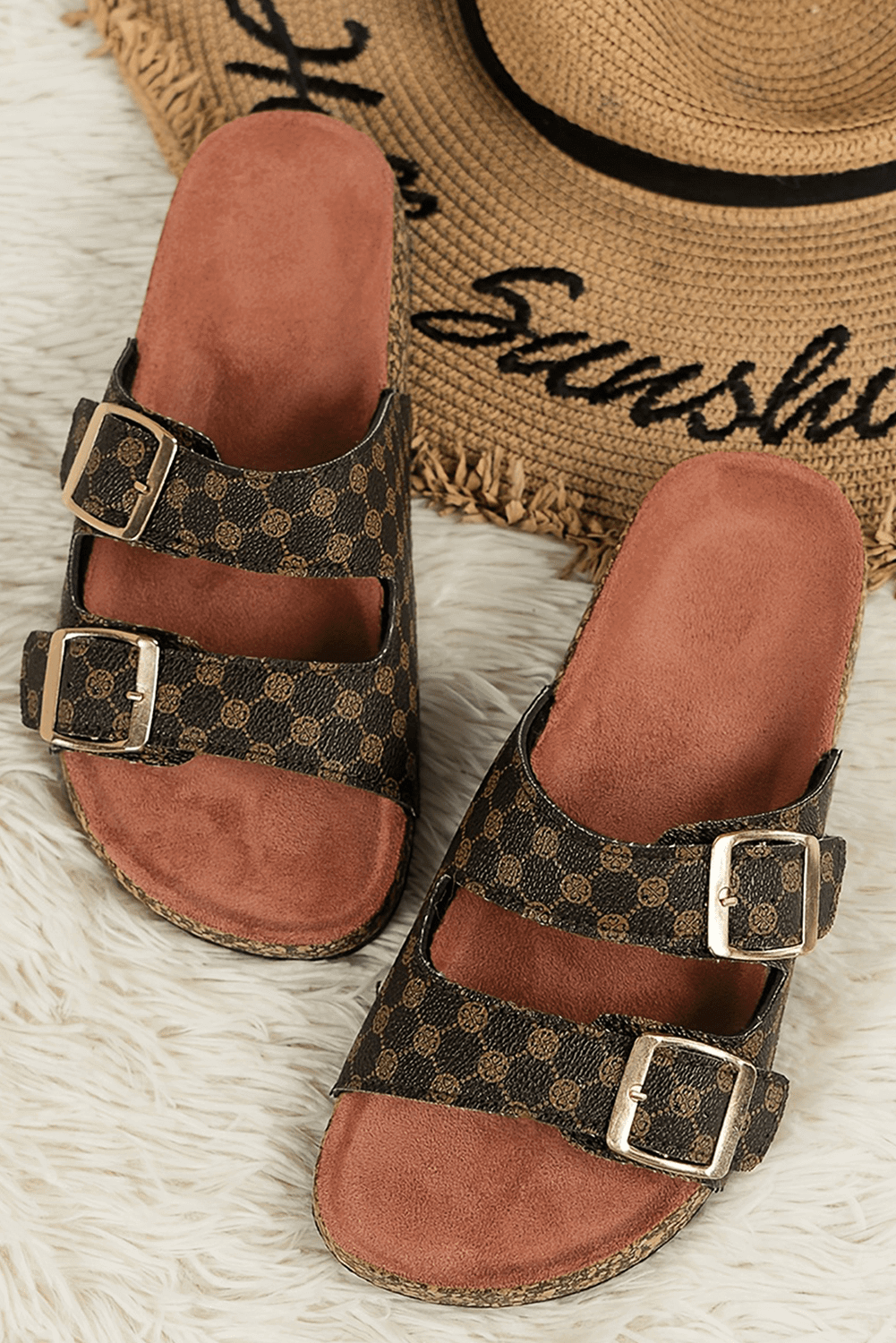 Women’s Cowgirl Charm double buckle slip-on sandals with comfort footbed and brown monogram print slides.