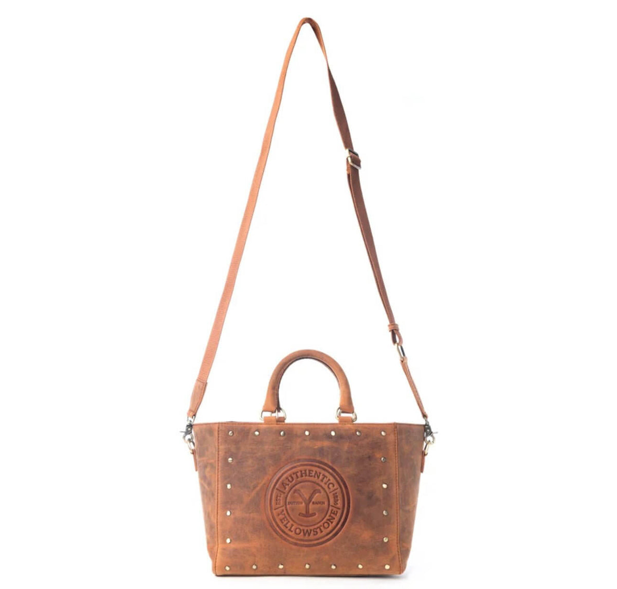 Yellowstone Legancy studded leather tote bag by Cowgirl Charm featuring a rugged design and silver stud accents.