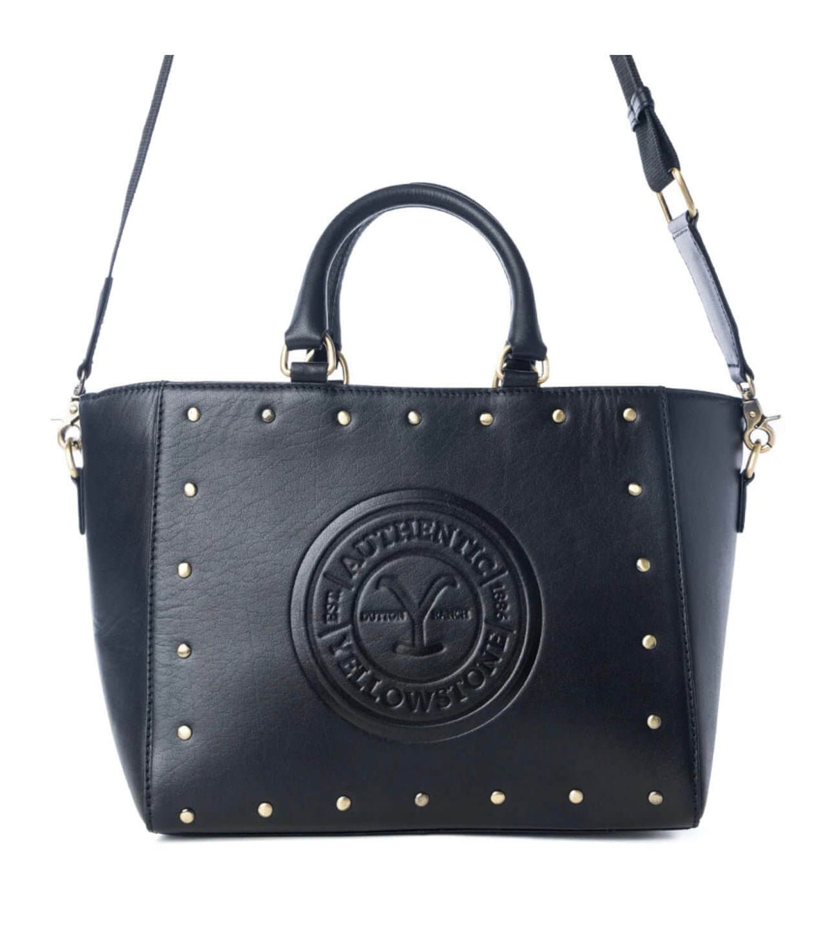 Cowgirl Charm Yellowstone Legancy studded leather tote bag with metal accents and sturdy handles, stylish and spacious for everyday use.