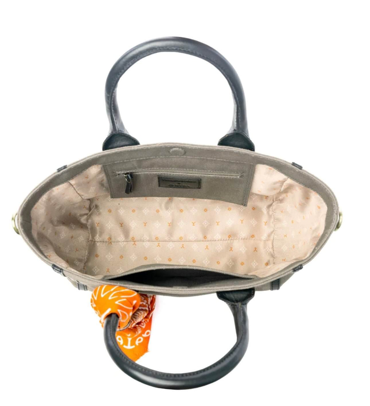 Myra Bags Yellowstone Montana crossbody bag with attached scarf, featuring a leather and fabric design with decorative accents.