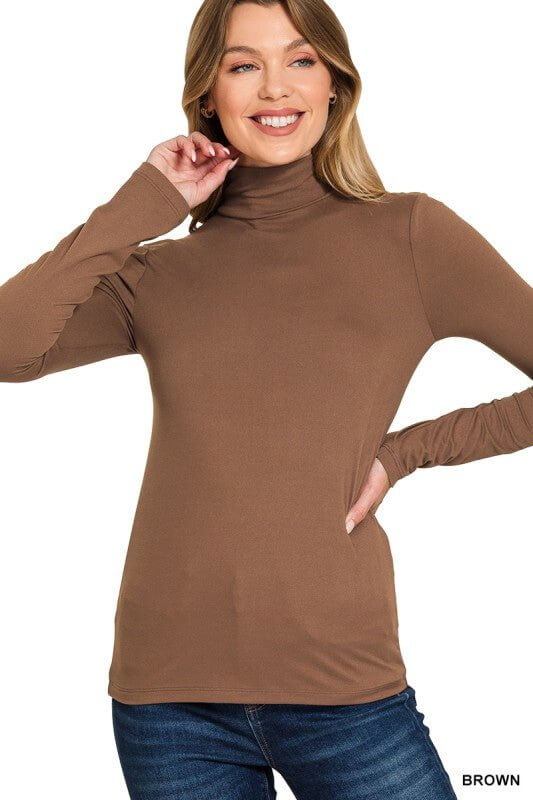 Zenana long sleeve turtleneck top, soft and basic layering tee for women, with a fitted silhouette and classic neckline.